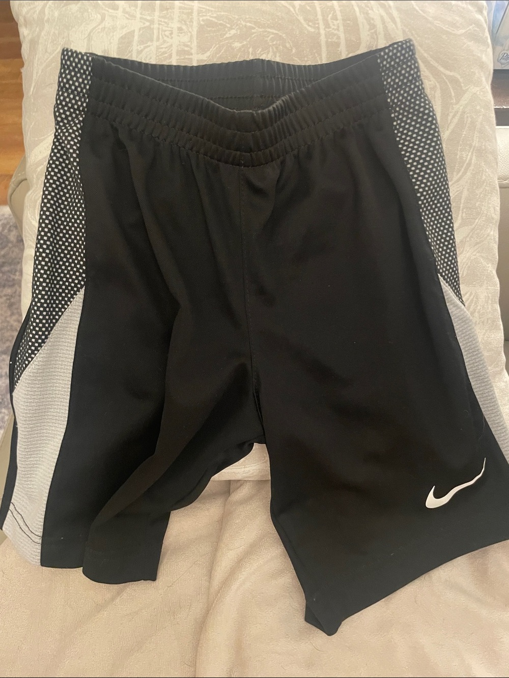 Boys Nike Black Shorts with White Swoosh and Gray Side Panels